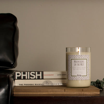 Mountains in the Mist scented 12 oz. soy candle in upcycled wine bottle - FKA Earthen Oak