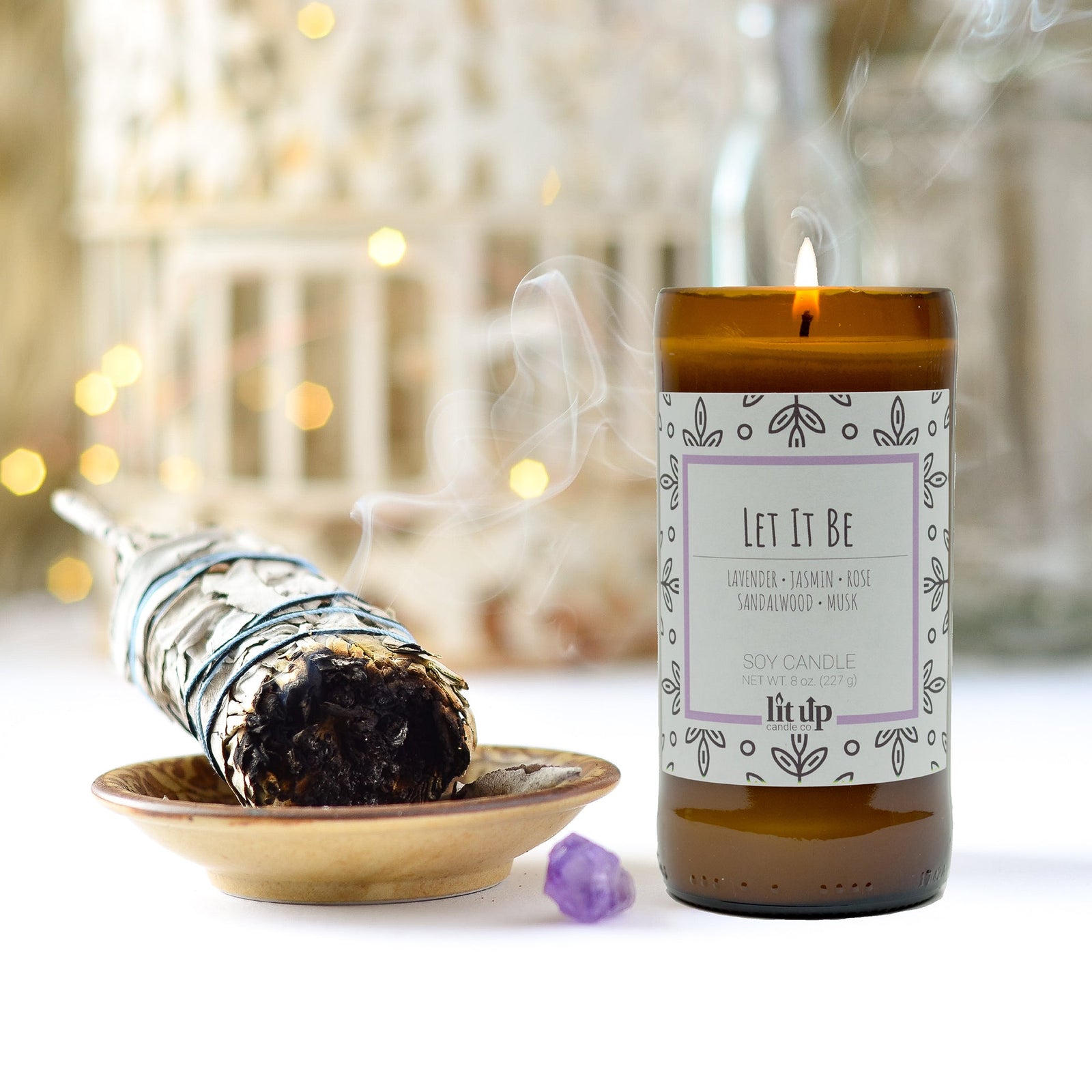 Let It Be scented soy candle in upcycled beer bottle burning with sage